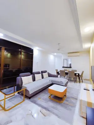 a living room with a couch and a table at Nice Stay 16pax at Wisma Cosway Pavilion KLCC Bukit Bintang in Kuala Lumpur