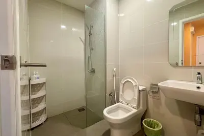 a bathroom with a toilet and a sink and a shower at Continew by Xuan and Partner near KLCC and Bukit Bintang in Kuala Lumpur