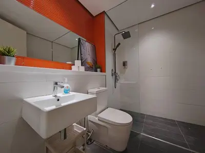 a bathroom with a sink and a toilet at Arcoris Mont Kiara 7# Main Street #Walking 1MK# 163 Retails# 2 BR Balcony 2-4Pax in Kuala Lumpur