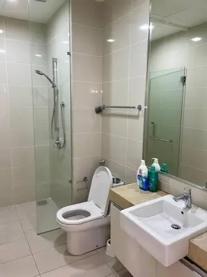 a bathroom with a shower and a toilet and a sink at [M City Duplex Studio] Stunning High Floor View! in Kuala Lumpur
