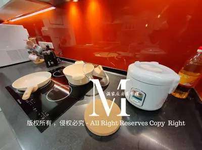 a kitchen with two crockpots on a counter at Arcoris Mont Kiara 23# 2 Bedroom Balcony #2-4pax in Kuala Lumpur