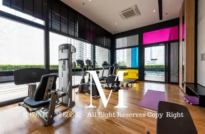 a gym with treadmills and cardio equipment in a building at Arcoris Mont Kiara 23# 2 Bedroom Balcony #2-4pax in Kuala Lumpur