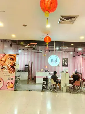 a restaurant with people sitting at tables in a room at Summer Suites KLCC By Palace in Kuala Lumpur
