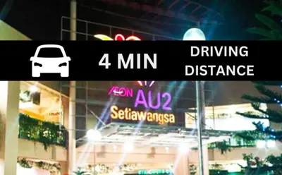 a street sign that reads driving distance and a car at Seeds Hotel Setia Wangsa in Kuala Lumpur