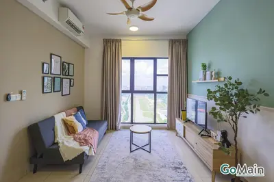 a living room with a couch and a tv at Free Parking - Big Suite Trion Kuala Lumpur by GoMain in Kuala Lumpur