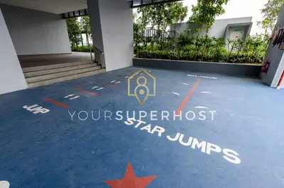 a parking lot with a star painted on the floor at Trion@KL by YourSuperhost in Kuala Lumpur