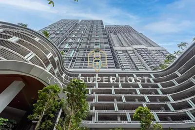 a tall building with a sign on the side of it at Trion@KL by YourSuperhost in Kuala Lumpur