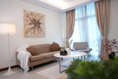 a living room with a couch and a table at Studio, 6 Pax, 3mins to KLCC (3A01_2) in Kuala Lumpur