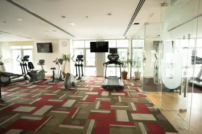 a gym with treadmills and exercise equipment in a room at Studio, 6 Pax, 3mins to KLCC (3A01_2) in Kuala Lumpur