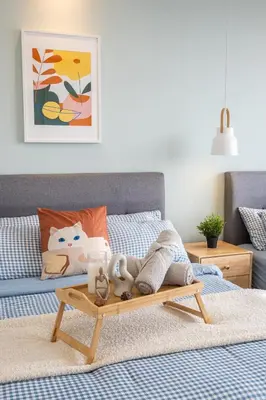 a bedroom with a bed with a wooden coffee table at Continew Residensi by Feel Home in Kuala Lumpur