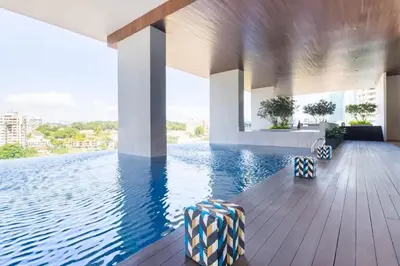 a swimming pool with a view of the water at The EST Bangsar Kuala Lumpur in Kuala Lumpur