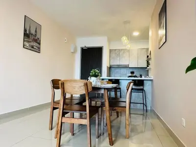 a kitchen and dining room with a table and chairs at MVD19#Family Suite 8pax 3 Rooms M Vertica Velocity Mall Cheras IKEA Mytown Short Walk to MRT & LRT Maluri in Kuala Lumpur