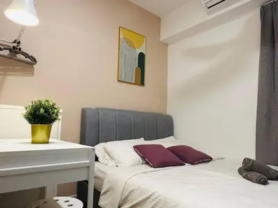 a bedroom with a bed and a table and a sink at MVD19#Family Suite 8pax 3 Rooms M Vertica Velocity Mall Cheras IKEA Mytown Short Walk to MRT & LRT Maluri in Kuala Lumpur