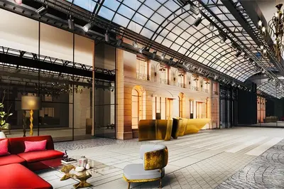 a lobby with a red couch and a glass ceiling at Scarletz suites klcc Bukit Bintang by lulu in Kuala Lumpur