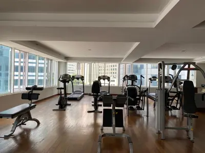 a gym with treadmills and exercise equipment in a building at Couple Suite For Bukit Bintang S/R in Kuala Lumpur