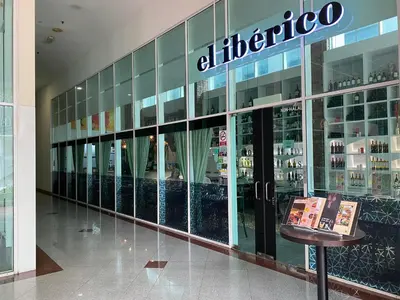 a store with a sign on the side of a building at Couple Suite For Bukit Bintang S/R in Kuala Lumpur