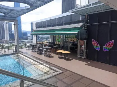 a restaurant with a butterfly painted on the side of a building at D'Majestic Place in Kuala Lumpur