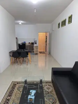 a living room with a couch and a table at vista sentul residence share apartment with host in Kuala Lumpur