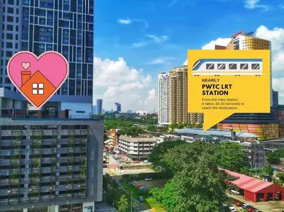 a city with a heart sign on top of buildings at Chambers A Studio Flat, KLCC & KL Tower ,view in City in Kuala Lumpur