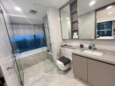 a bathroom with a shower and a toilet and a sink at Eaton Residence KLCC By HM Costa Doro in Kuala Lumpur