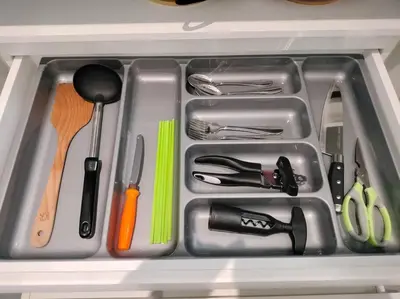 a drawer filled with utensils in a refrigerator at Continew TRX Corner House +2 Balconies +2 Rooms in Kuala Lumpur