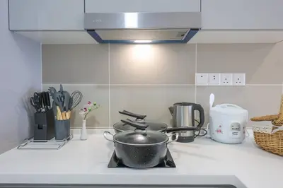 a pot sitting on a stove in a kitchen at Conveniently Located Trion KL Premium Amenities in Kuala Lumpur