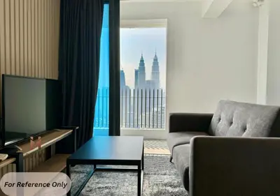 a living room with a couch and a large window at The Colony BEST SKY Pool View in Kuala Lumpur