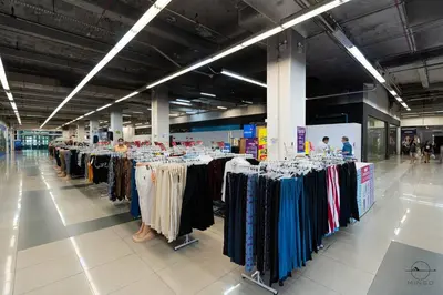 a clothing store with many racks of clothes on display at Scott Garden #23th KLCC view #MidValley Megamall in Kuala Lumpur