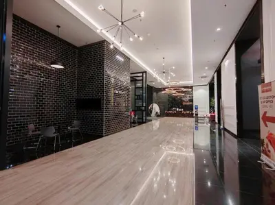 a lobby with a dance floor in a building at Chambers Residence by Manhattan Group in Kuala Lumpur