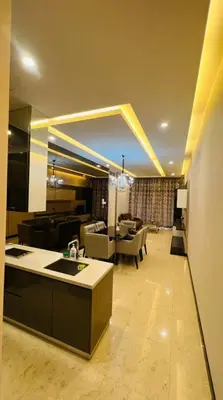 a large living room with a kitchen and a living room at The Dorsett Residence Service Suite KL in Kuala Lumpur