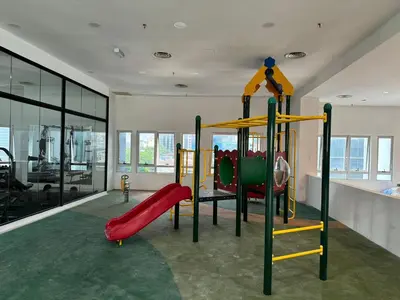 a play room with a playground with a slide at Cozy home in city center with free parking -1D in Kuala Lumpur