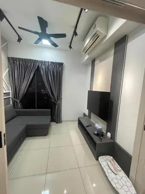 a living room with a couch and a tv at TRX Continew Residence by Nia in Kuala Lumpur