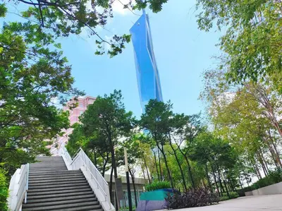 a stairway leading up to a tall building at Robertson to be opened in Kuala Lumpur