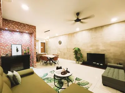 a living room with a couch and a ceiling fan at 7 Kuala Lumpur City for 4 to 12 PAX of 4 BEDROOMS and 3 BATHROOMS near KLCC in Kuala Lumpur