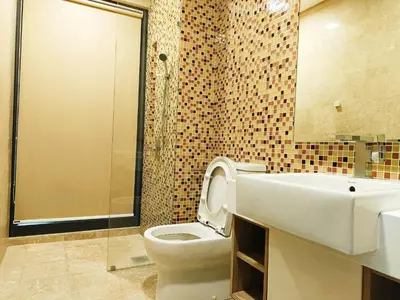 a bathroom with a toilet and a sink and a shower at 8 Kuala Lumpur City for 4 to 10 PAX of 4 BEDROOMS and 3 BATHROOMS near KLCC in Kuala Lumpur