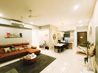 a living room with a couch and a dining room at 8 Kuala Lumpur City for 4 to 10 PAX of 4 BEDROOMS and 3 BATHROOMS near KLCC in Kuala Lumpur