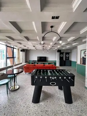 a large room with a pool table in it at Scarletz Suites KLCC by Luxe Suites in Kuala Lumpur