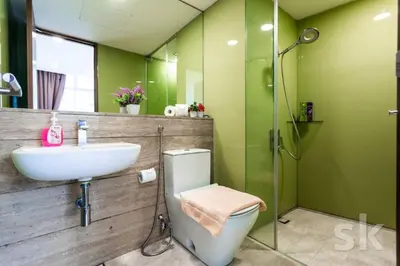 a bathroom with a sink and a toilet and a shower at Vortex suites KLCC by Nadia Guesthouse Kuala Lumpur in Kuala Lumpur