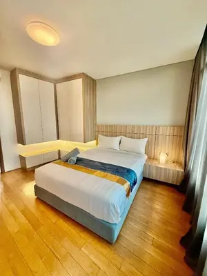 a bedroom with a large bed in a room at Vortex suites KLCC by Nadia Guesthouse Kuala Lumpur in Kuala Lumpur