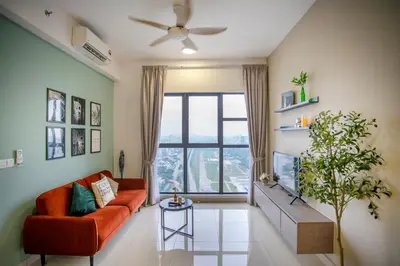 a living room with a red couch and a large window at Trion Residence KL near TRX, MyTown, Ikea Cheras, Pudu in Kuala Lumpur