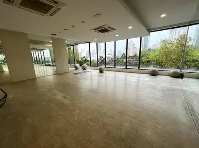 an empty room with a large room with windows at The Robertson KLCC 1 room 1 bathroom by JZ in Kuala Lumpur