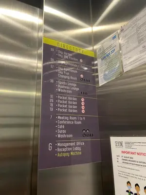 a sign on the side of an elevator with a menu at Staybliss At Ceylonz Suites in Kuala Lumpur