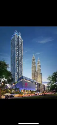 a city skyline with tall buildings in the foreground at Star Residence By M&T in Kuala Lumpur