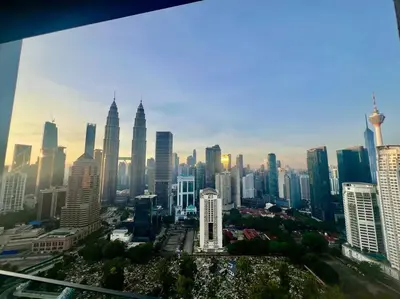 a view of a large city with tall buildings at Legasi High floor 3 BR KLCC view in Kuala Lumpur