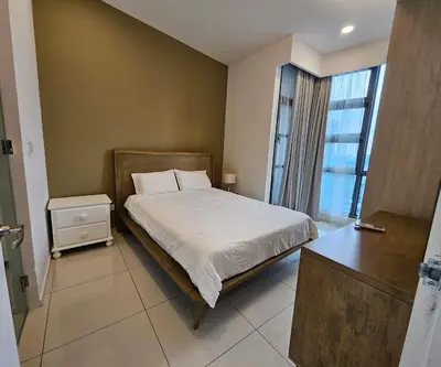 a small bedroom with a bed and a window at Apartment at Robertson by Wgshomestay in Kuala Lumpur