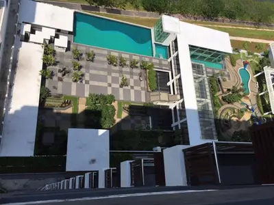 an aerial view of a building with a swimming pool at Ubays Zetepark House in Kuala Lumpur