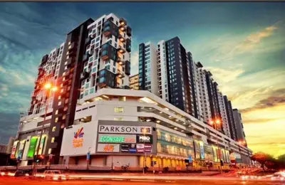 a tall building with a sign in front of it at Ubays Zetepark House in Kuala Lumpur