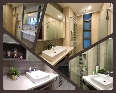 a bathroom with two sinks and a mirror at The Royal Reside in Kuala Lumpur