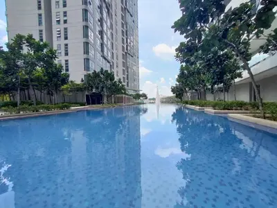 a swimming pool in a city with tall buildings at The Royal Reside in Kuala Lumpur