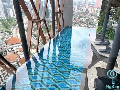 a swimming pool on top of a building at Scarletz Starlight Suites KLCC in Kuala Lumpur